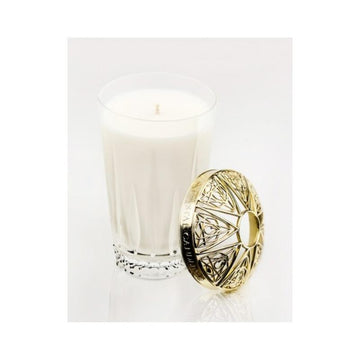 A scented candle in a wooden box